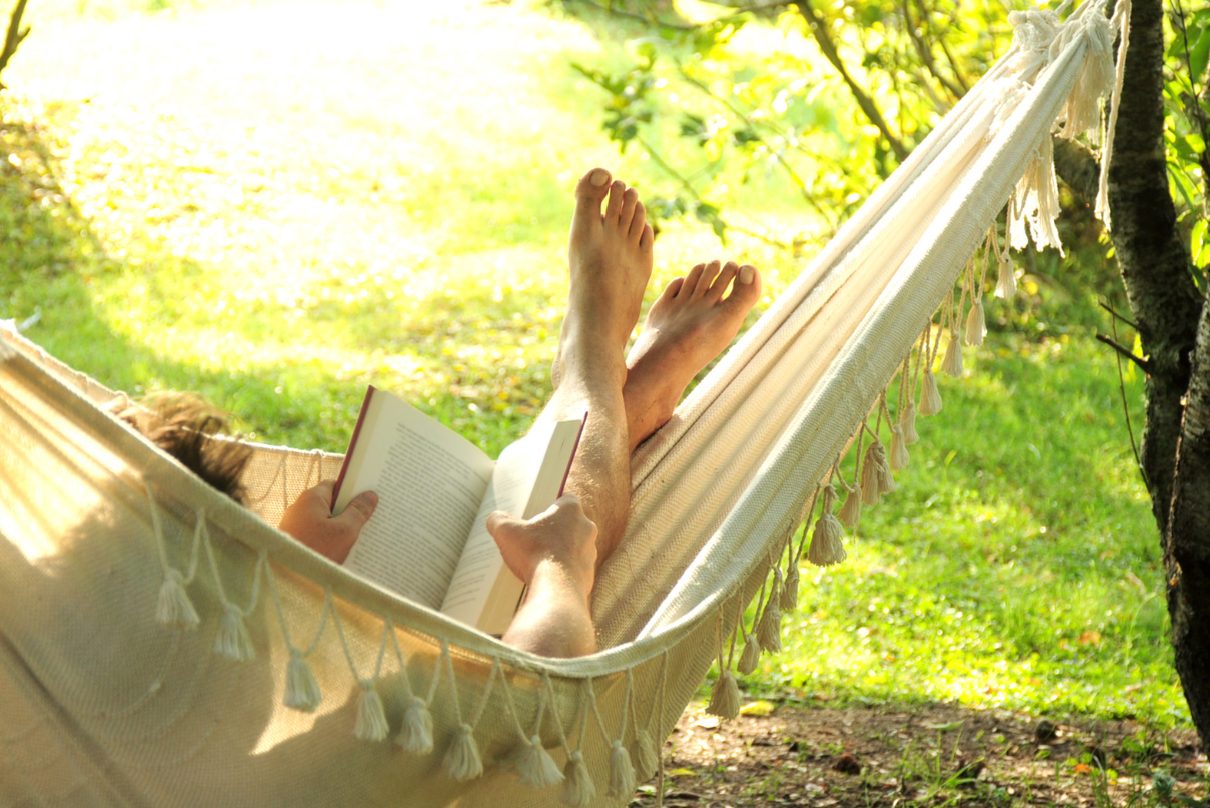 Person relaxing in a hammock
